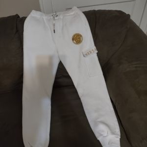 A Versace womans sweat suit tried on once so pretty much brand new